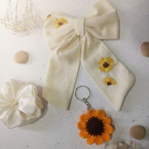 handmade sunflower accessory set – embroidered linen hair bow, satin scrunchie, and crochet keychain