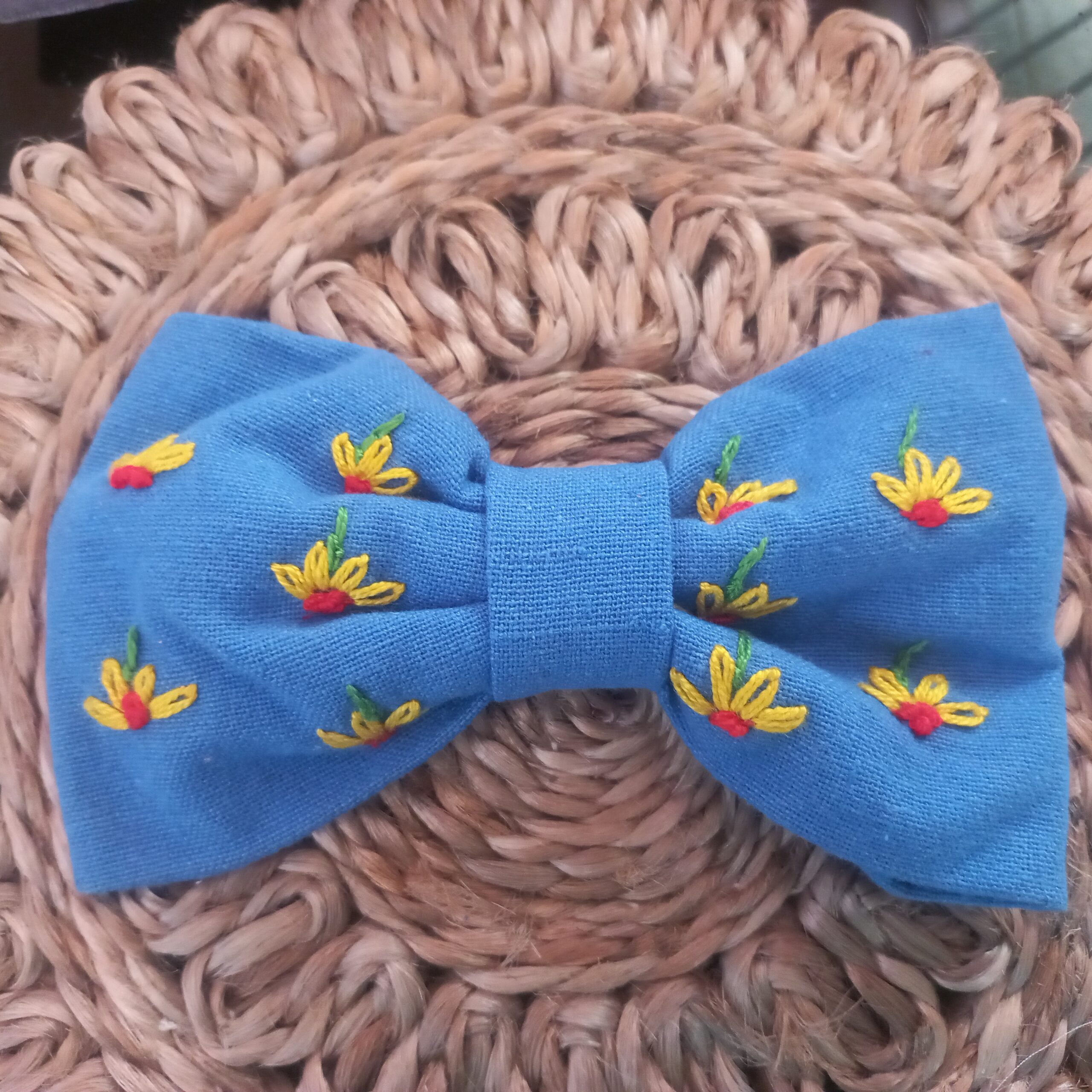 handcrafted sky blue hair bow with yellow wildflower embroidery handcrafted sky blue hair bow with yellow wildflower embroidery